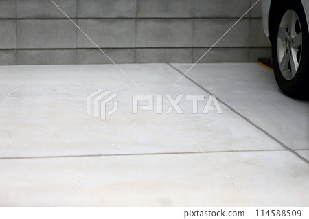 Image of a concrete paved parking lot Image of a concrete paved parking lot 114588509