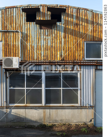 Old ruins of a factory 114592863