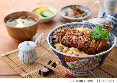 A Japanese meal set of hot katsudon and miso soup A Japanese meal set of hot katsudon and miso soup 114592903
