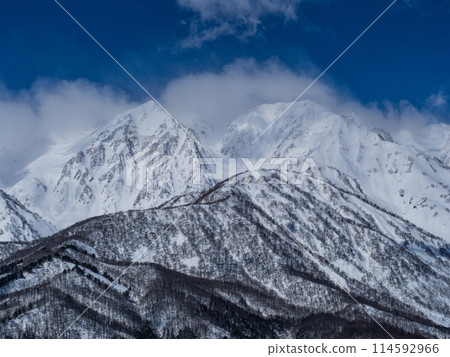 The Northern Alps in mid-winter covered in clouds, Hakuba Village, Nagano Prefecture The Northern Alps in mid-winter covered in clouds, Hakuba Village, Nagano Prefecture 114592966