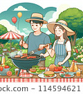 Couple having a barbecue 114594621