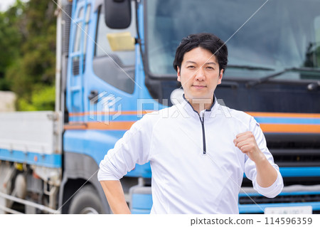 Driver standing in front of the truck Driver standing in front of the truck 114596359