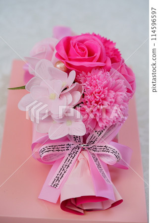 Mother's Day gift flower arrangement on white background 114596597