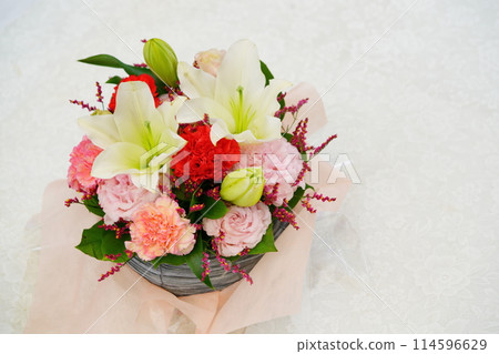 Mother's Day gift flower arrangement on white background 114596629