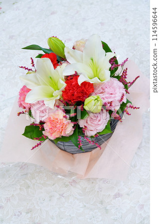 Mother's Day gift flower arrangement on white background Mother's Day gift flower arrangement on white background 114596644