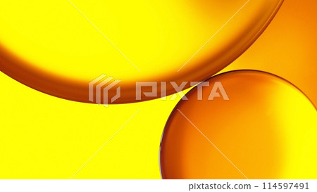 macro abstract photography of oil and water on golden yellow gradient background macro abstract photography of oil and water on golden yellow gradient background 114597491
