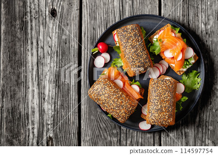 smoked salmon sandwiches on rye bread rolls 114597754