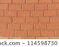 Red brick pavement texture with a regular, rectangular pattern. 114598730