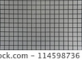 Square grid pattern with grey tiles, creating a clean, geometric texture. 114598736