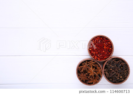 Spices mix on a white wooden background. Top view Spices mix on a white wooden background. Top view 114600713