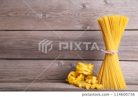 Delicious mixed pasta on grey background with copy space 114600736