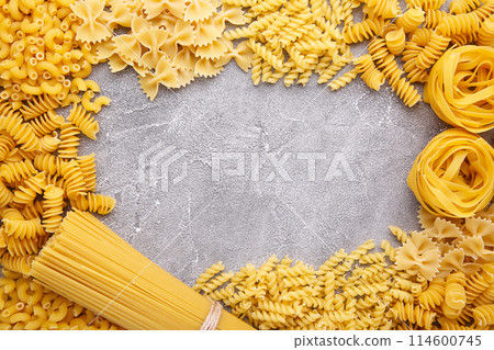 Delicious mixed pasta on a grey concrete background, frame 114600745