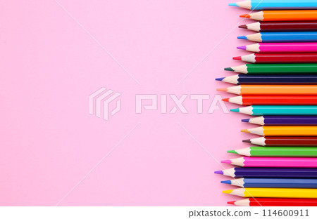 Many different colored pencils on pink background Many different colored pencils on pink background 114600911