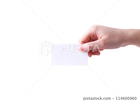 Woman holding white business card in hand isolated on a white background. Woman holding white business card in hand isolated on a white background. 114600960