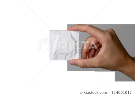 A package of white condom in a girl's hand. PNG A package of white condom in a girl's hand. PNG 114601012