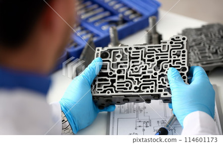 The auto repair service repairman in automatic 114601173