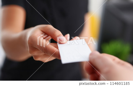 businesswoman give her business card to her new partner closeup 114601185