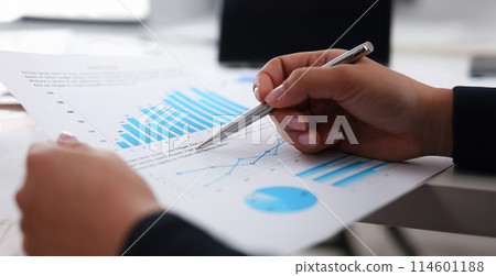 businesswoman study documents in office closeup businesswoman study documents in office closeup 114601188