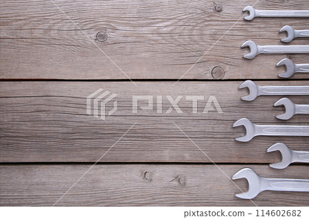 New wrenches for repair on grey background, copy space 114602682