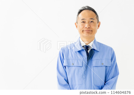 Man in work clothes, portrait Man in work clothes, portrait 114604876