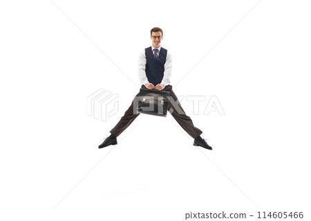 Happy smiling man in formal wear, employee, office worker jumping with briefcase isolated on white background. Getting promotion Happy smiling man in formal wear, employee, office worker jumping with briefcase isolated on white background. Getting promotion 114605466