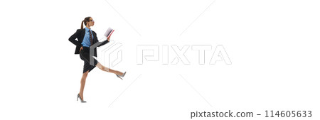 Businesswoman team leader in formal wear walking and looking in notes before project presentation isolated on white background 114605633