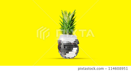 Disco ball with pineapple top against bright yellow background. Tropical party. Contemporary art collage. Disco ball with pineapple top against bright yellow background. Tropical party. Contemporary art collage. 114608951