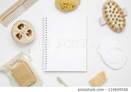 Natural organic eco cosmetics. Soap Eco, reusable cotton pads, loofah natural sponge washcloth, cotton swab, eucalyptus leaves on white background. Flat lay, top view, copy space 114609588