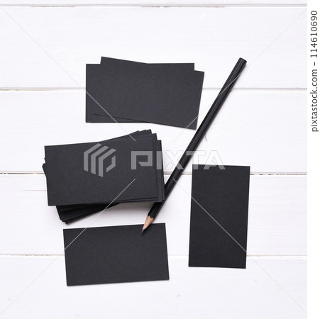 stacks of black business cards 114610690