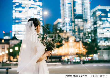 Bride walking through the city Bride walking through the city 114610966