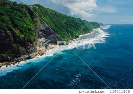 Mountain rocky landscape with coastline and turquoise ocean in Bali. Aerial view 114611306