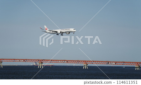 An aircraft about to land at an airport An aircraft about to land at an airport 114611351