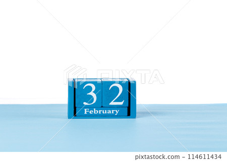 Wooden calendar February 32 on a white background 114611434