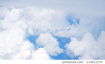 White clouds against a blue sky. View from above. White clouds against a blue sky. View from above. 114612254