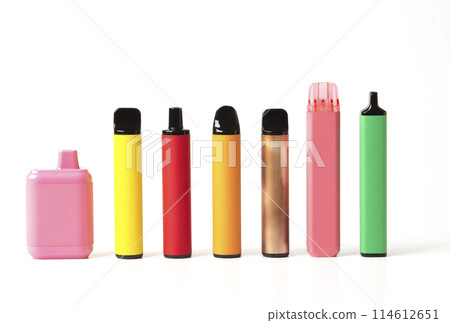 A set of colorful disposable electronic cigarettes of different shapes on a white background with smoke. Concept of modern smoking, vaping and nicotine. A set of colorful disposable electronic cigarettes of different shapes on a white background with smoke. Concept of modern smoking, vaping and nicotine. 114612651