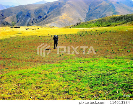 Uzbekistan Pamir mountains. Exploring the Majestic Mountains. A Tourist's Journey. Uzbekistan Pamir mountains. Exploring the Majestic Mountains. A Tourist's Journey. 114613584