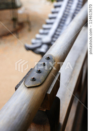 Handrail decorated with antique metal rivets, traditional japanese style. 114613670