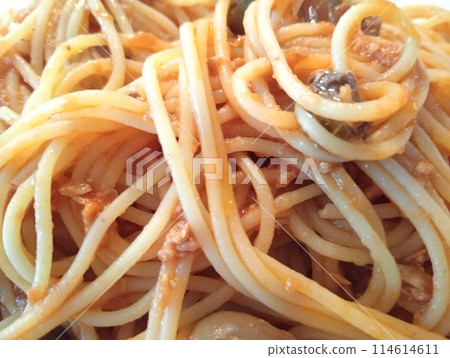 long pasta spaghetti with tuna sauce, anchovies and Taggiasca olives long pasta spaghetti with tuna sauce, anchovies and Taggiasca olives 114614611
