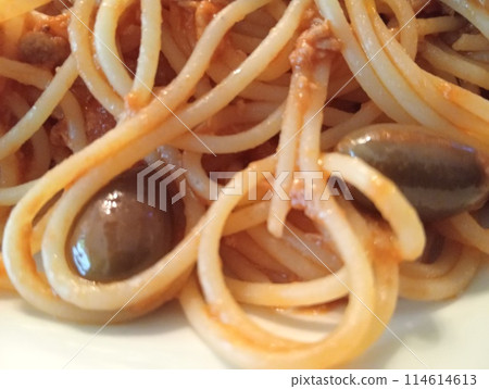 long pasta spaghetti with tuna sauce, anchovies and Taggiasca olives long pasta spaghetti with tuna sauce, anchovies and Taggiasca olives 114614613