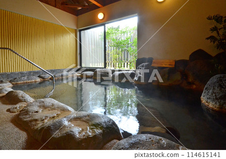 Relax in the rock bath as time flows by 114615141