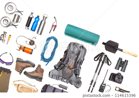 Set of tourist trekking items on white background. Top view of accessories for travel. Set of tourist trekking items on white background. Top view of accessories for travel. 114615396