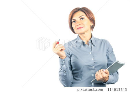Beautiful young business woman with a red pen and notebook in hands on a white background Beautiful young business woman with a red pen and notebook in hands on a white background 114615843