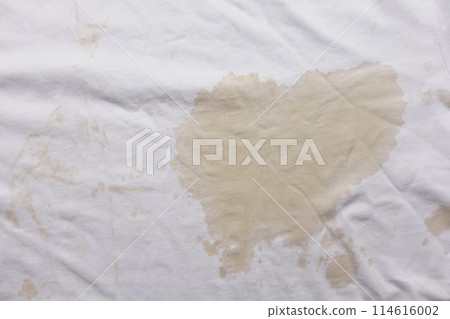 spilled coffee on white shirt closeup spilled coffee on white shirt closeup 114616002