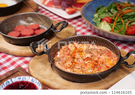 Turkish Menemen omelet in a frying pan. . Turkish Menemen omelet in a frying pan. . 114616105