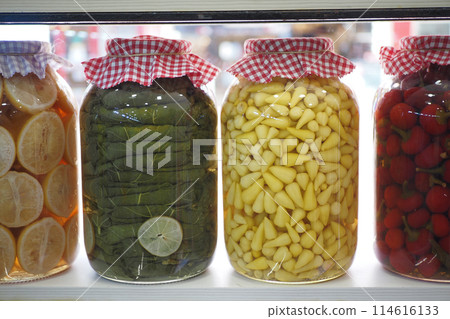 Canned fruits and vegetables in glass jars 114616133