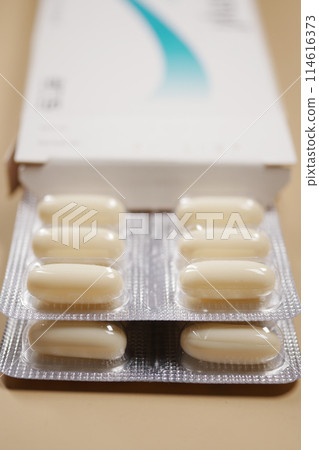 Close up of pills of blister pack on table  114616373