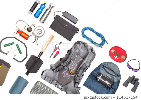 Set of tourist trekking items on white background. Top view of accessories for travel 114617154