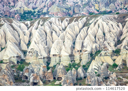 Volcanic rocks and limestone cliffs in Cappadocia valley. Turkey 114617520