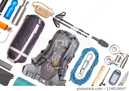 Set of tourist trekking items on white background. Top view of accessories for travel. Set of tourist trekking items on white background. Top view of accessories for travel. 114618047