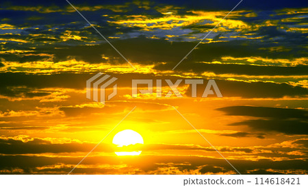 brightly colorful clouds in the evening sky. Lush colored clouds in the sky brightly colorful clouds in the evening sky. Lush colored clouds in the sky 114618421